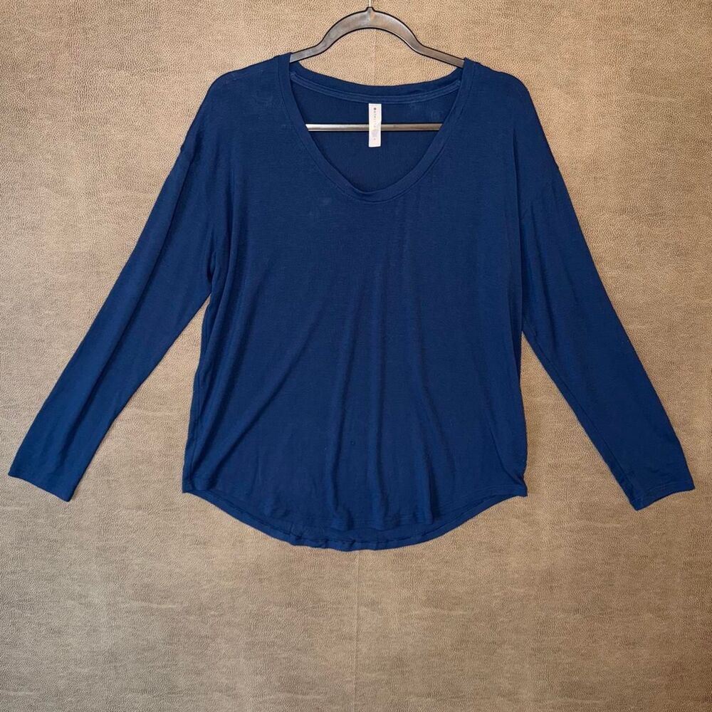 Athleta Navy blue long sleeve shirt with a relaxed fit